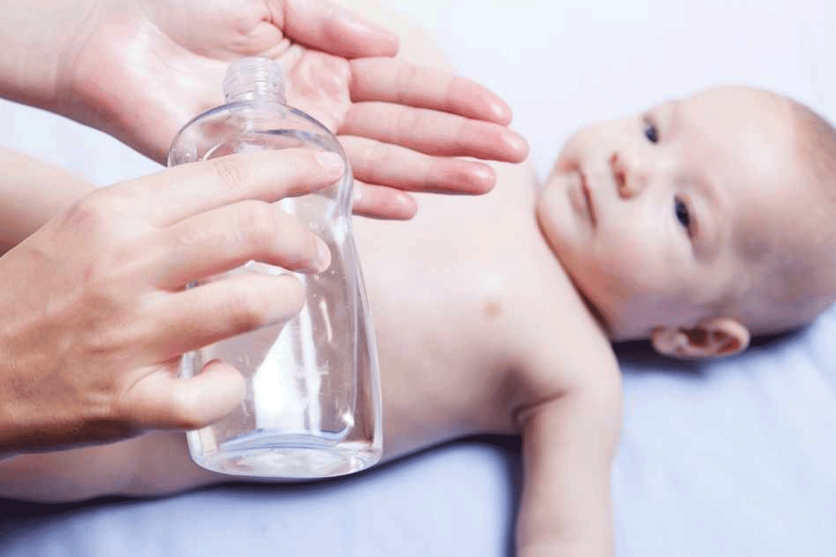 Baby being oiled for Is Baby Oil Flammable