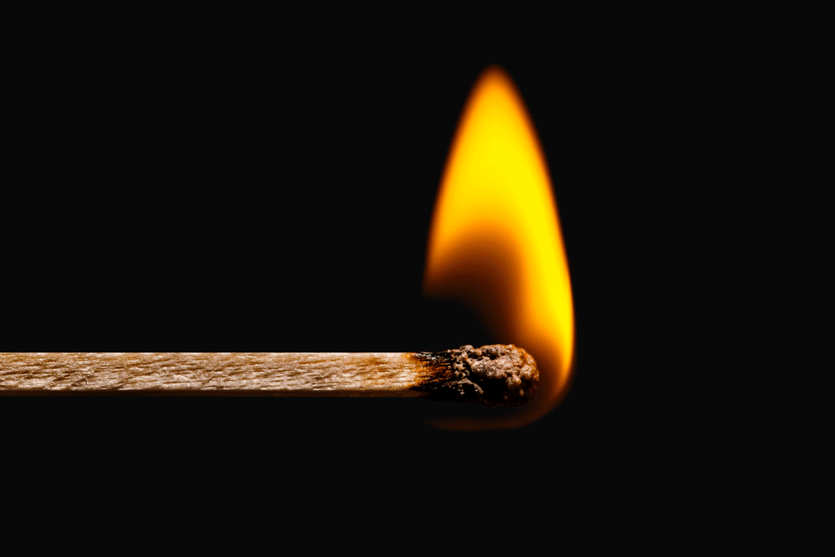 Lit match for wax flammability factors